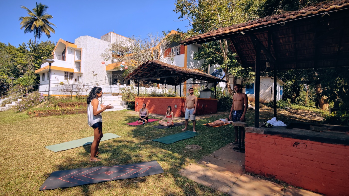 Morning yoga practice outdoors at Jungli