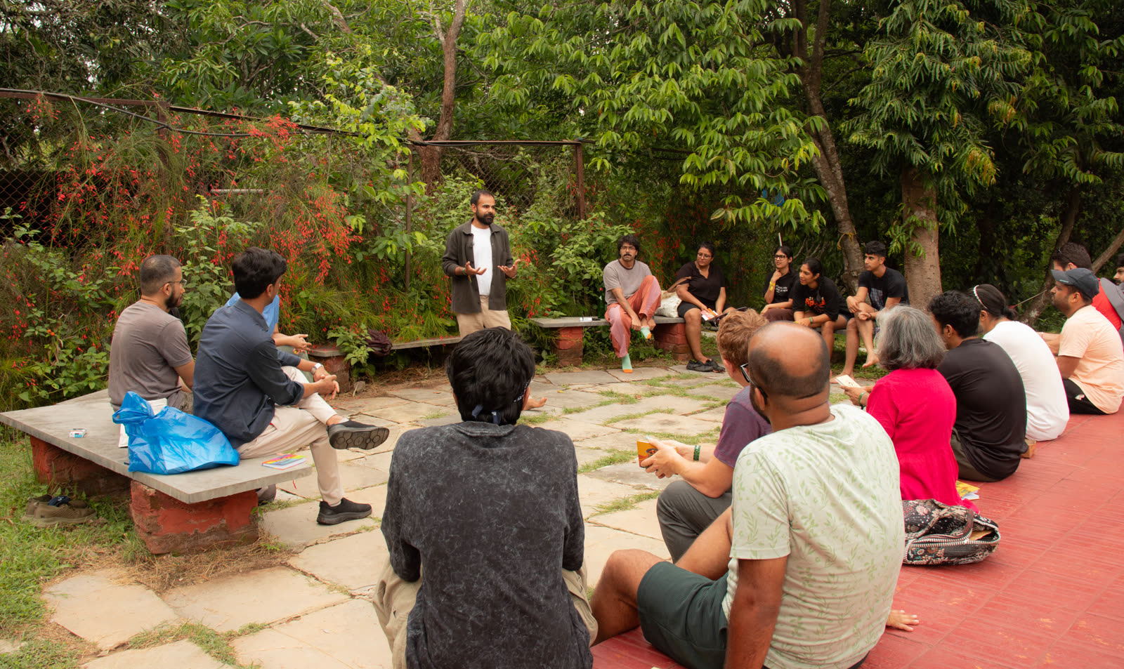 Community circle discussion outdoors at JTNF