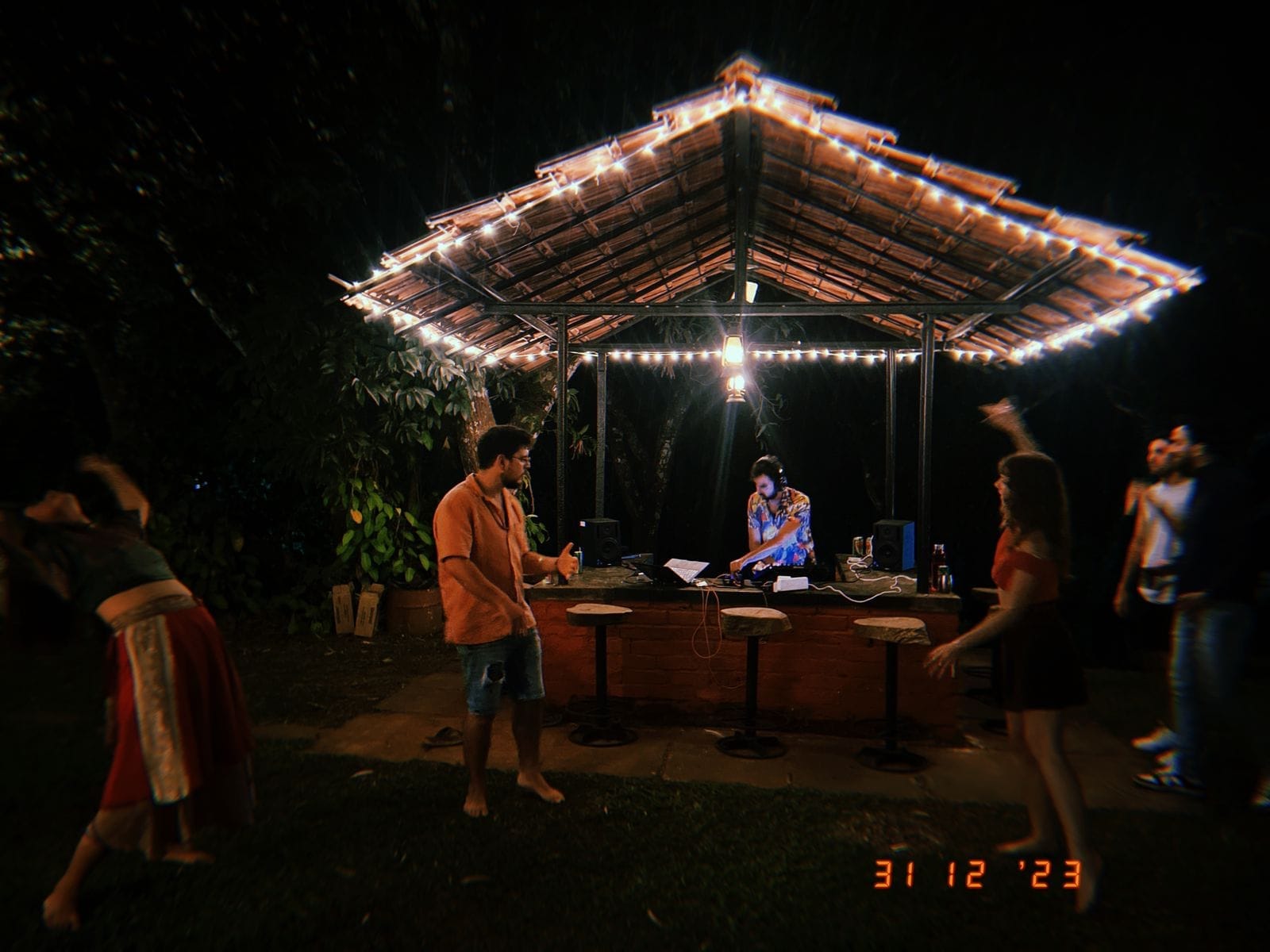The lit pavilion filling up on New Year's Eve at Jungli
