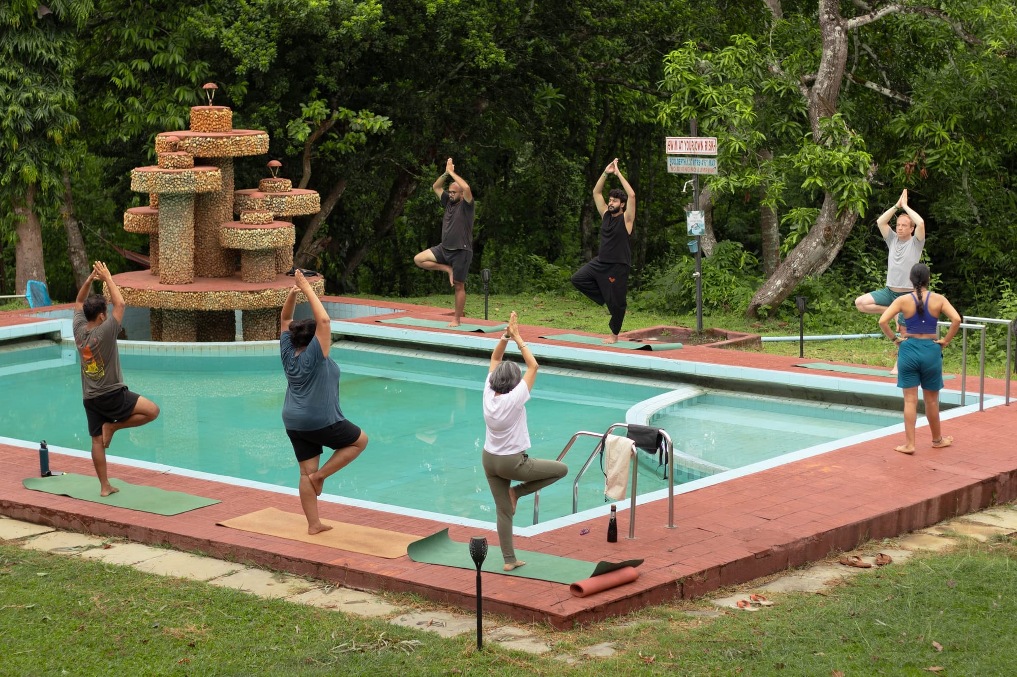 Yoga around the pool