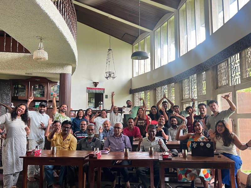 Residents packed into the double-height Jungli hall, hands in the air
